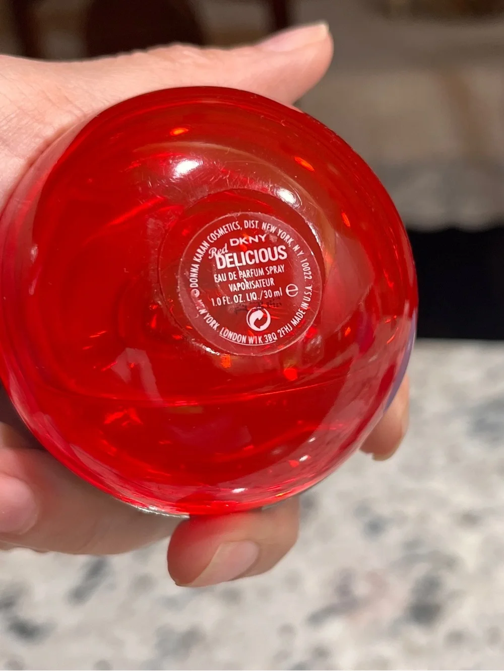 Dkny Red and Silver Spherical Body Oil Bottle